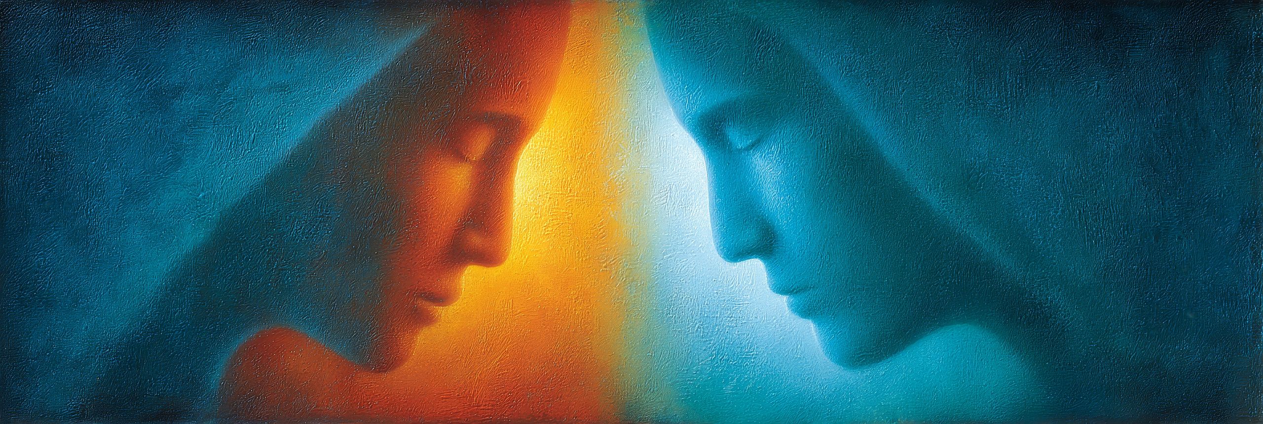 Zwei Gesichter in Blau und Orange symbolisieren die spirituelle Verbindung zwischen Seelenpartnern.